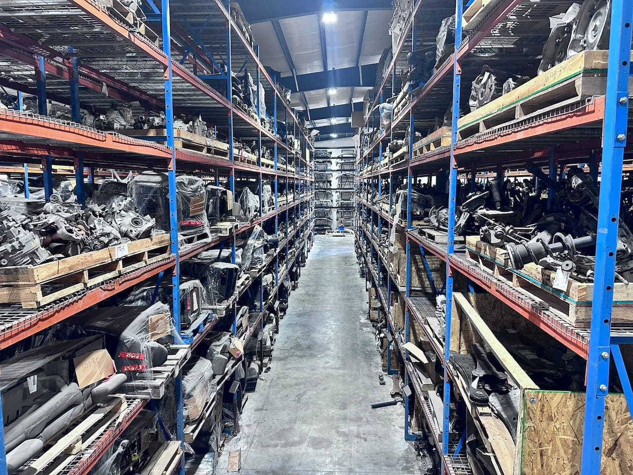 Aisle of parts inventory at 74 auto parts.